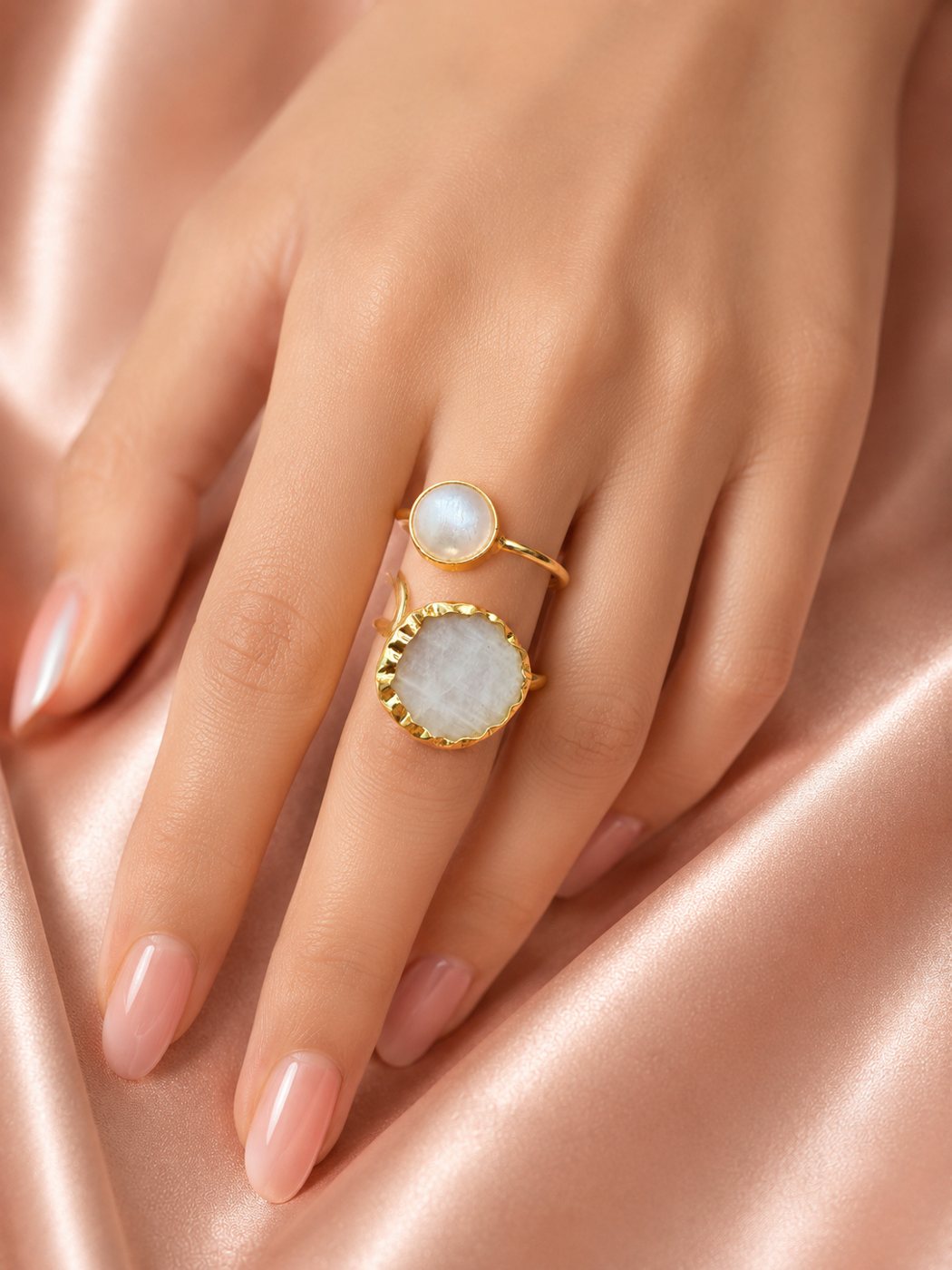 Delicate gemstone ring on hand